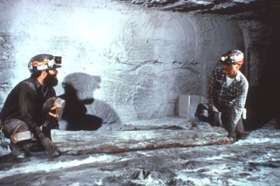 Men preparing to lift a beam