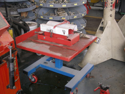 Small lifting table is used to hold parts when repairing equipment.
